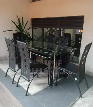 Executive 6 Sitter Glass Dinning Table With Leather Seat