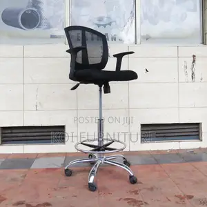 Office Chair : Ergonomic Mesh Cashier Chair With a Chrome Footrest.