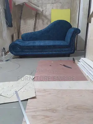 Elegant Blue Chaise Lounge With Studded Detailing
