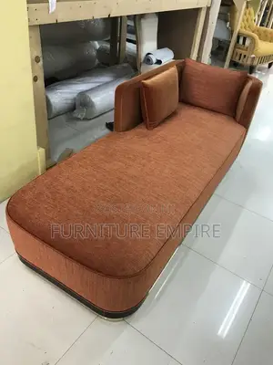 Stylish Orange Chaise Lounge With Cushions
