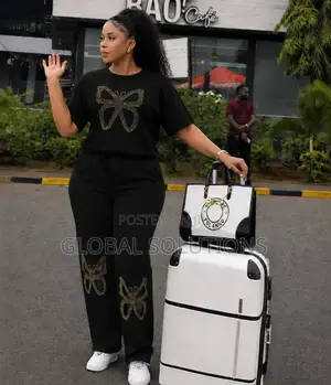 Two-Piece Sweat Suit With a Gold Butterfly Rhinestone Embellishments