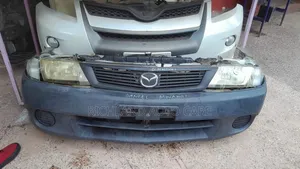 Nosecut Nissan Wingroad Y11/ Mazda Familia