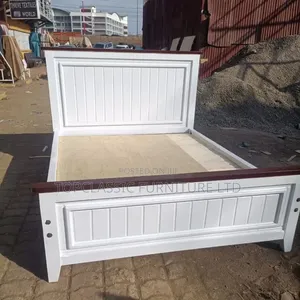 Panel Bed 5x6 White With Chocolate on Top.