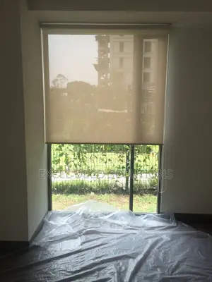 Sunscreen Roller Blinds – Elegant Light Filtering Solution