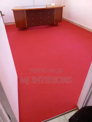 Executive Red Office Carpet Rolls Ready for Fitting