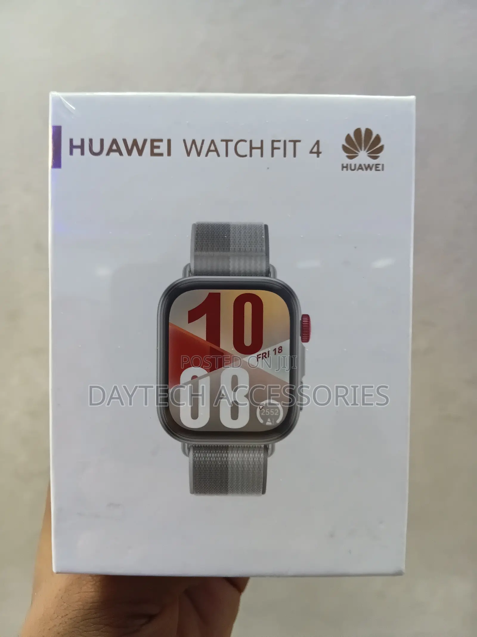 This Is a Huawei Watch Fit 4 Smart Watch With a Grey Strap.