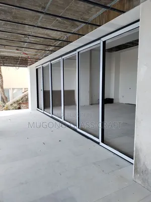 Brand New Aluminium Sliding Doors and Glasses