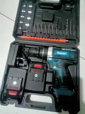 Makita Cordless Drill Set With Two Batteries and Accessories.