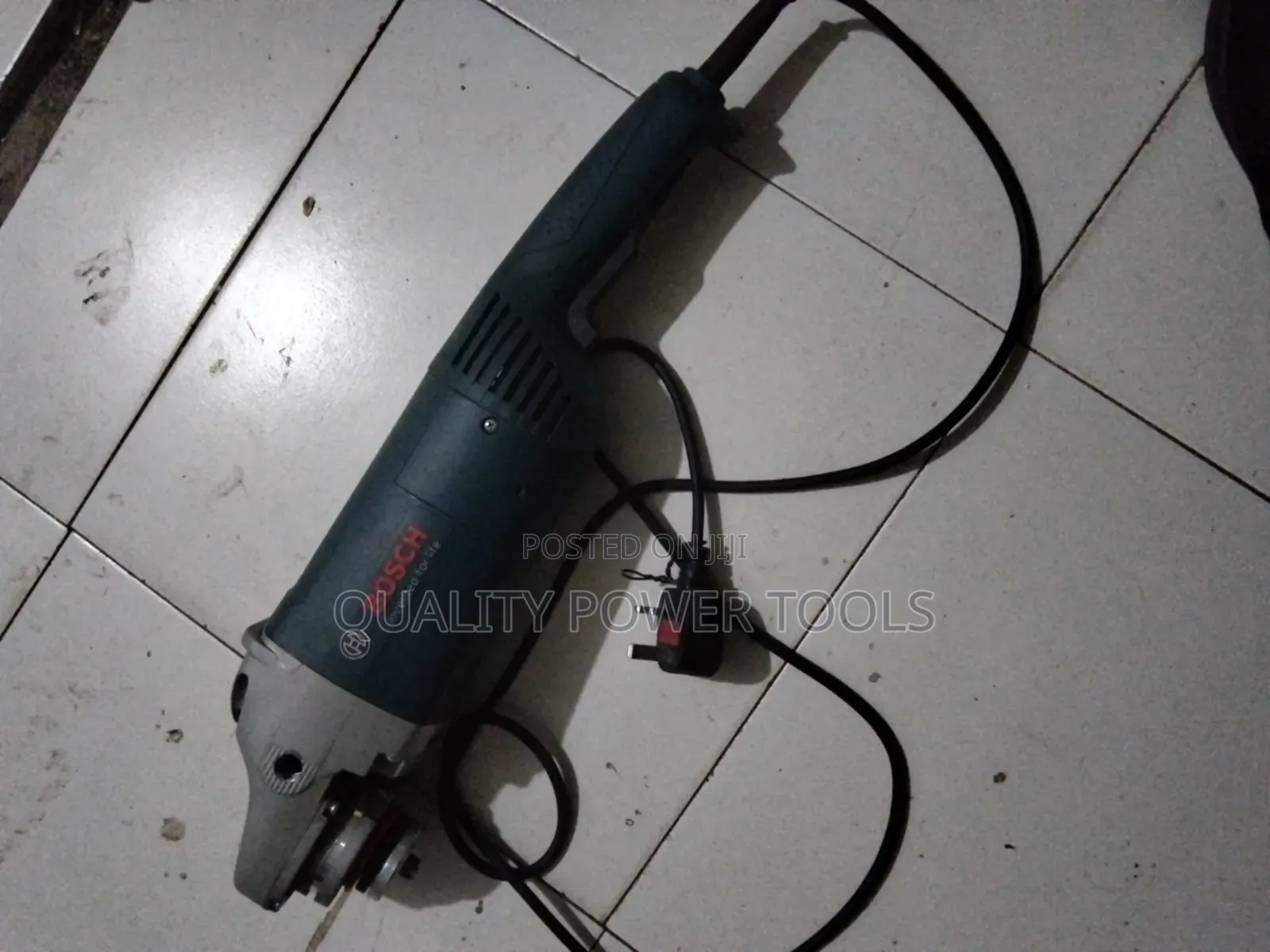 Bosch Angle Grinder, Likely a 9-Inch (230mm) Model.