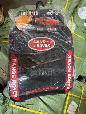 Red Logo Land Rover With Textured Grooves Intended to Trap Dirt