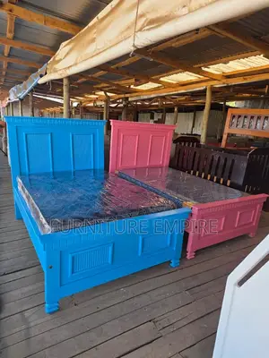 Blue and Pink Wooden Beds