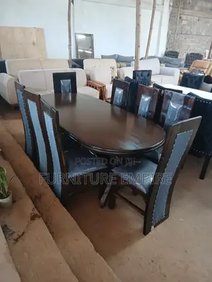 Dark Wooden Oval Dining Set – 8 High-Back Chairs Included