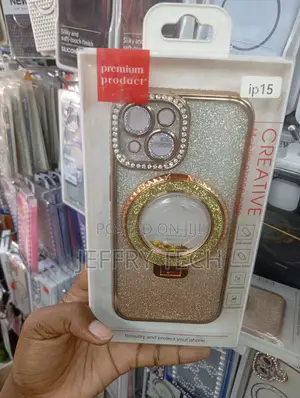 Gold Plated iPhone 15 Case Featuring a Rhinestone Camera Border