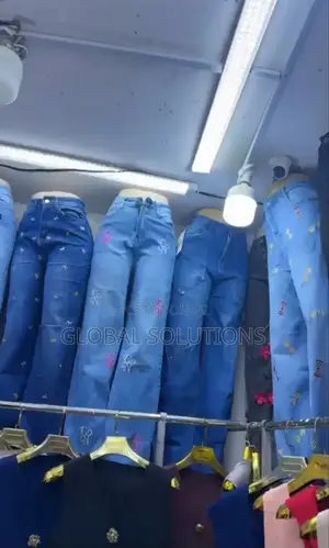 Stylish Women's High-Waisted Denim Jeans With Embroidered "Cn" Logos