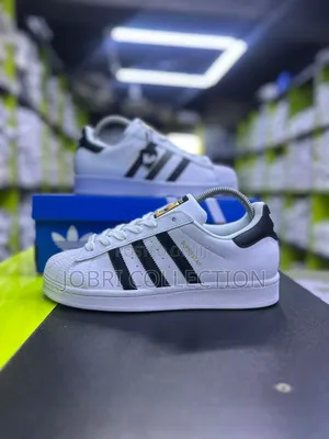 White Adidas Superstar Sneakers