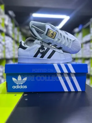 White Adidas Superstar Sneakers