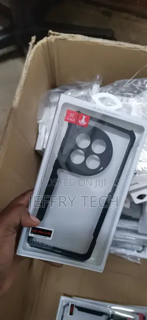 Oneplus 12 5g With a Black Frame and Clear Back Case
