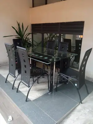 Executive 6 Sitter Glass Dinning Table With Leather Seat