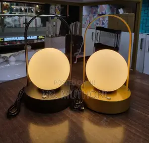 Dimmable Cordless Led Table Lamp With a Portable Arched Handle
