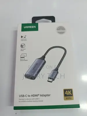 Ugreen Cm297 Usb-C to Hdmi Adapter in a Gray Aluminum Alloy Finish.