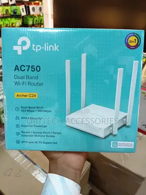 This Is a Tp-Link Archer C24 Ac750 Wireless Dual Band Router in White.