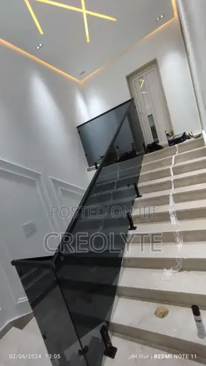 Smoked / Tinted Glass Railing System — Sleek Contemporary