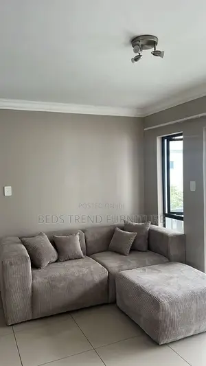 4 Seater Modern Grey Corduroy With Ottoman.