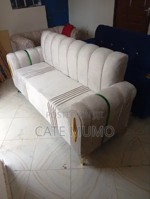 A Cream 3 Seater Sofa
