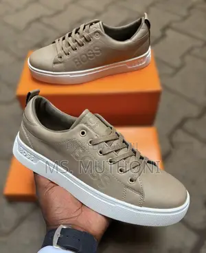 Hugo Boss Men's Leather Sneakers Featuring a Thick White Rubber Sole.