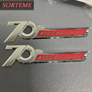 70th Anniversary Polished Chrome Lettering Red Background Lettering