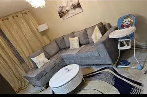 6 Seater Gray L-Shaped Sectional Sofa.