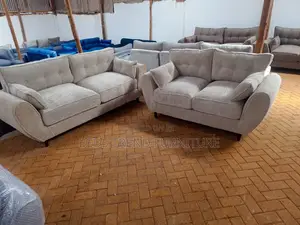 5 Seater Light Grey Butterfly Sofa Set.