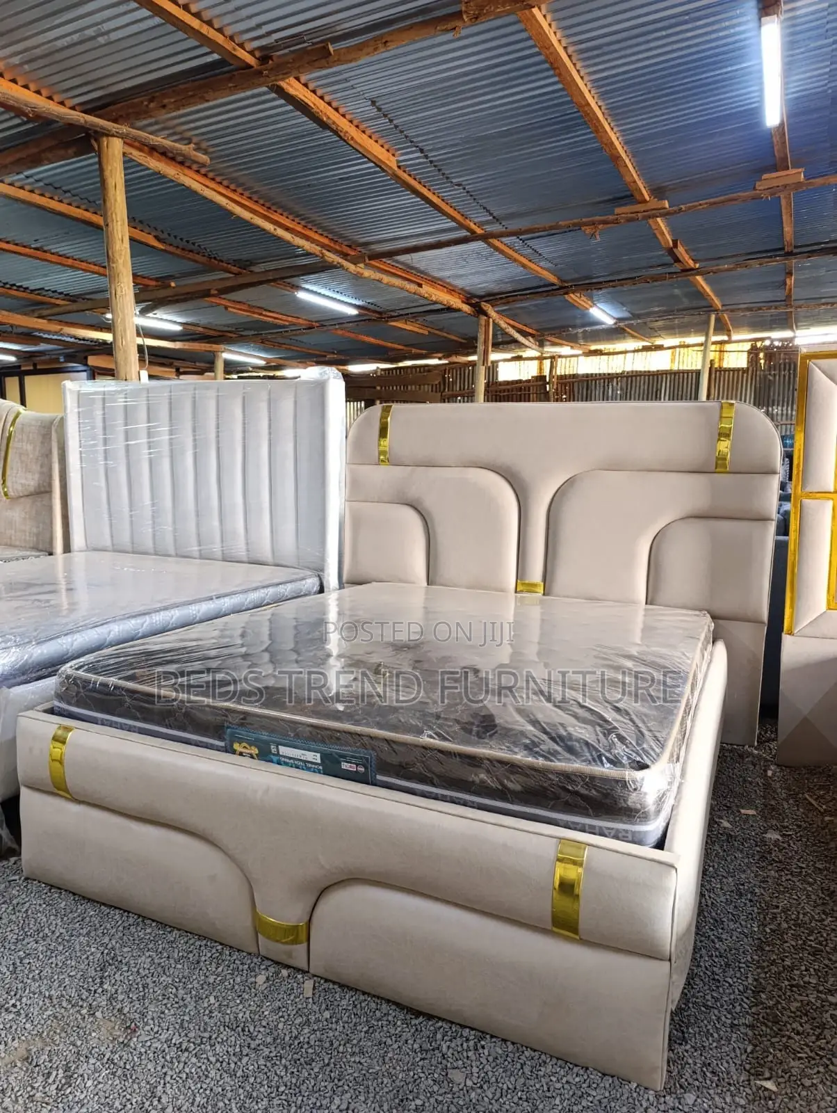 Beige Upholstered 5by6 Bed.