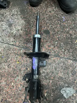 Front Shock Nissan Tiida