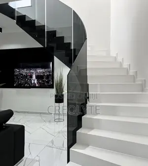 Curved Frameless Glass Balustrade | Smoked/Tinted | Spiral Staircase