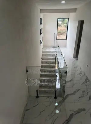 Frameless Glass Balustrade | Matte Black Spigots | Staircase Landing