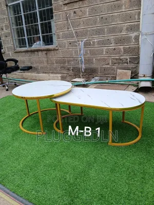 Nesting Tables With Marble Effect Finish.