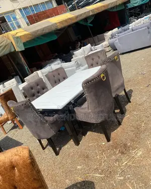 6-Seater Marble Dining Table – Grey Tufted Chairs