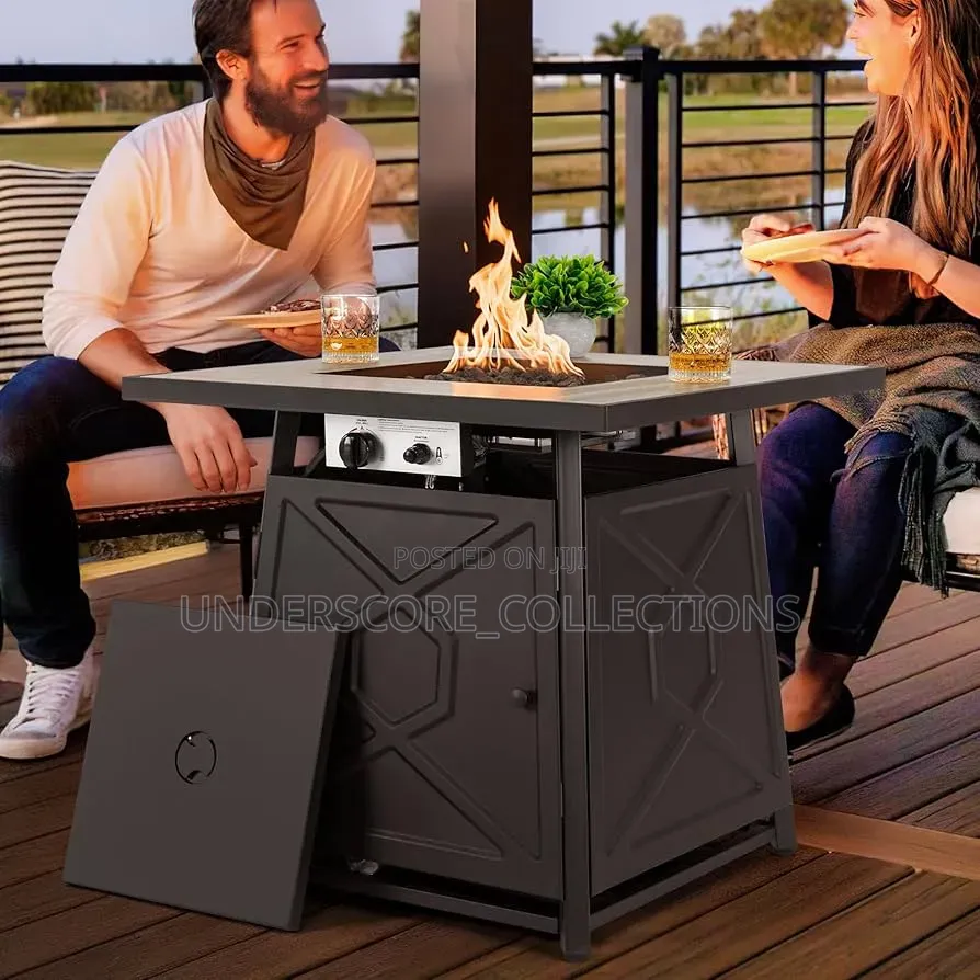 Propane Fire Pit Table With A Black Iron Frame And Ceramic Top.