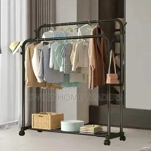 *Double Pole Clothing Rack With Wheels Lower Storage Shelf for Boxes