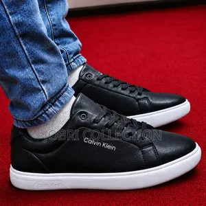Black Sole White Leather Calvin Klein Sneakers