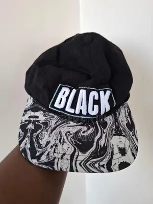 Black Embroidered Cap With Marble-Print Brim