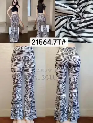 Fashion Nova Boho Dreams Zebra Flare Pants