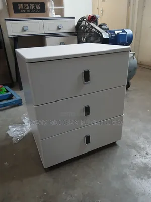 A Light Gray 4-Drawers Vertical Cabinet