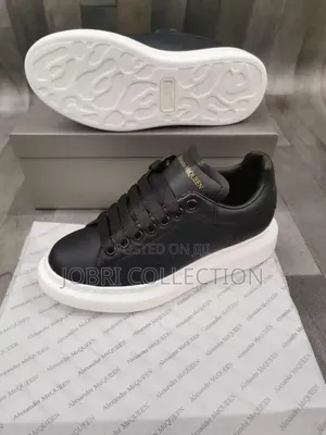 Full Black Sole White Alexander McQueen Sneakers