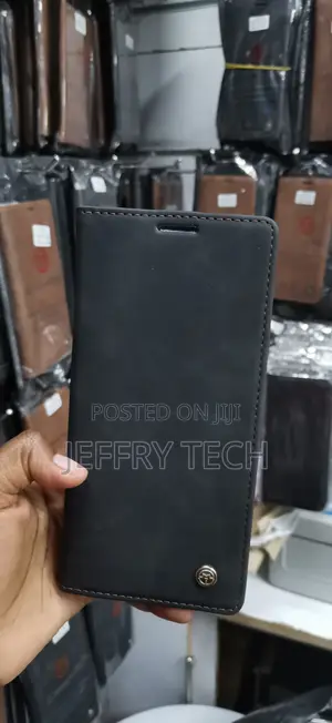 Black Suede Leather Flip Wallet Case With a Small Silver Logo Stud