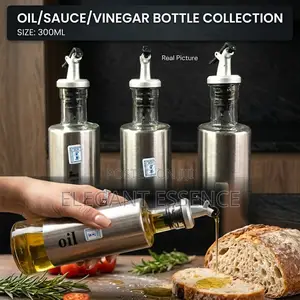 Oil Bottle With a Clear Glass Body and a Stainless Steel Sleeve -300ml