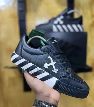The Off-White Low Vulcanized Sneakers in Black and White Leather