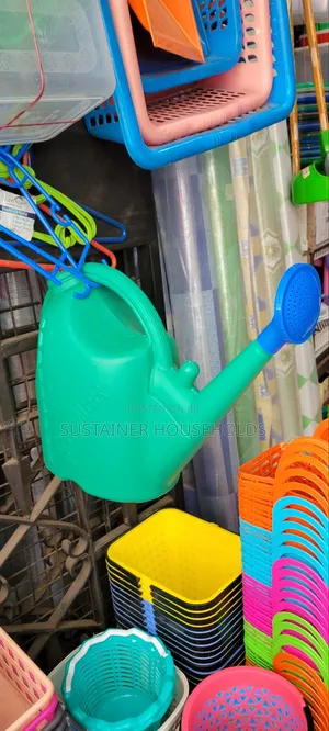 Green Flower Bed Watering Can