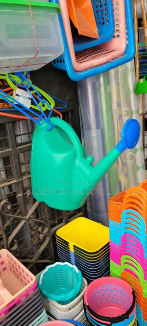 Green Flower Bed Watering Can